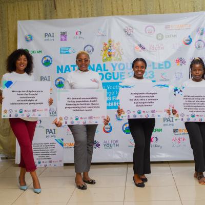 Some Of The Delegates Holding Conference Placards